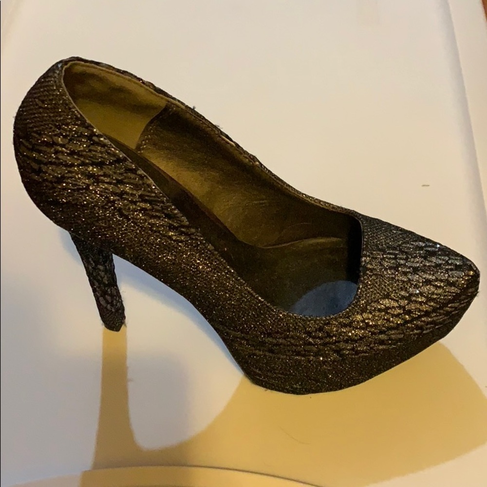Black and Silver Foreign Exchange Heels. Size 5.5